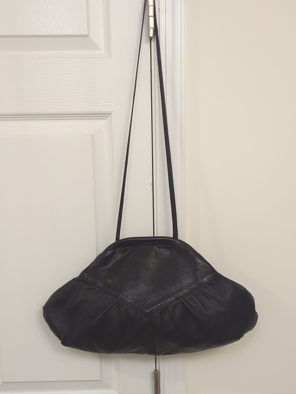 Sleek Black Shoulder Bag with Textured Panel